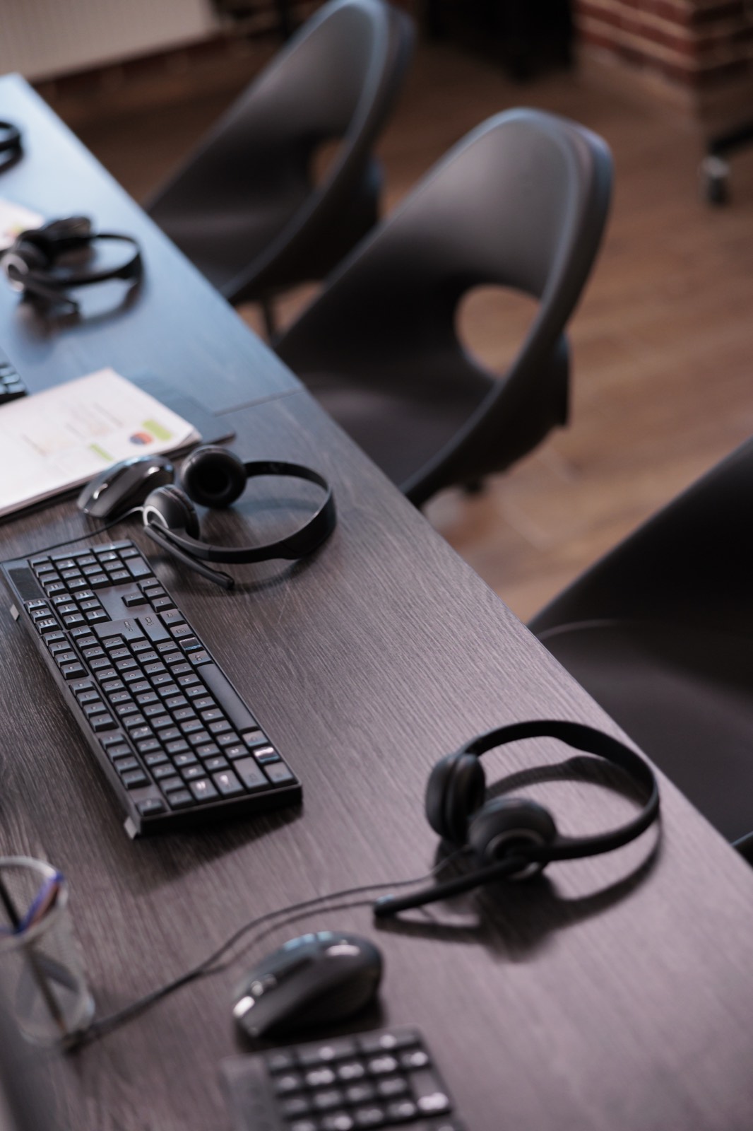 A helpdesk workstation with telephony equipment